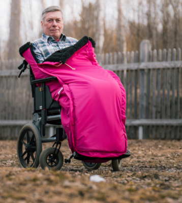 rosa cerise åkpåse benskydd teddy ull rullstol