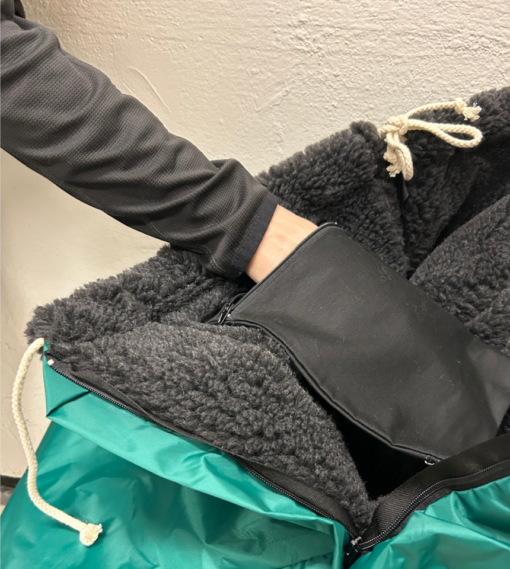 Grön åkpåse benksydd hemsida ficka insida